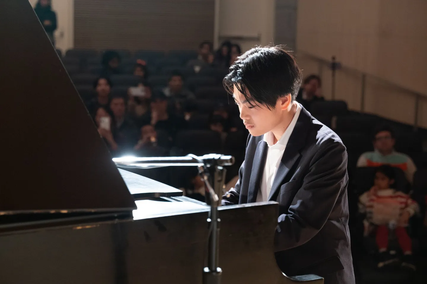 Ethan Chung performing at the piano